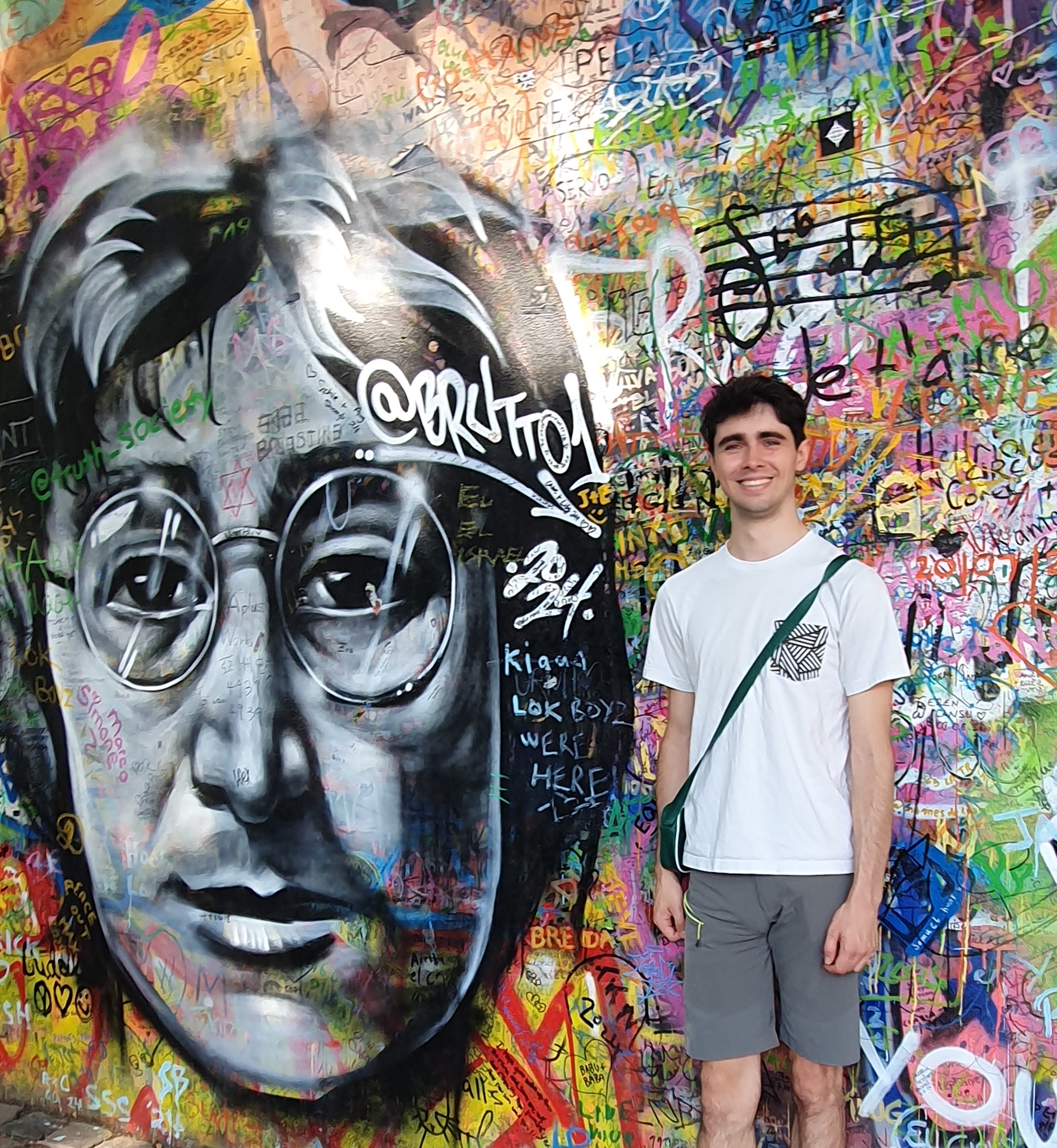 Daniel standing in front of John Lennon Wall, Prague 5/09/24