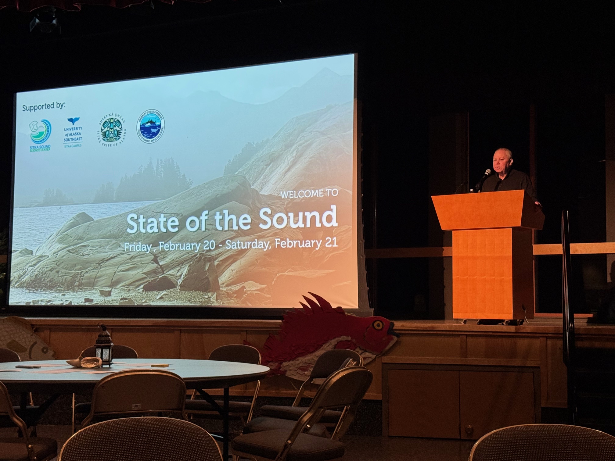 Sitka Tribe of Alaska member Mike Miller gives a keynote address at the 2026 State of the Sound symposium in Sitka.